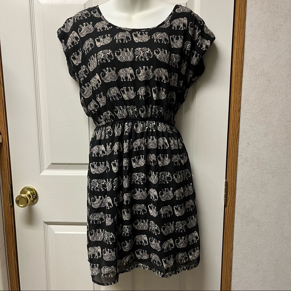 Maurices size medium black dress with cream paisley elephant design